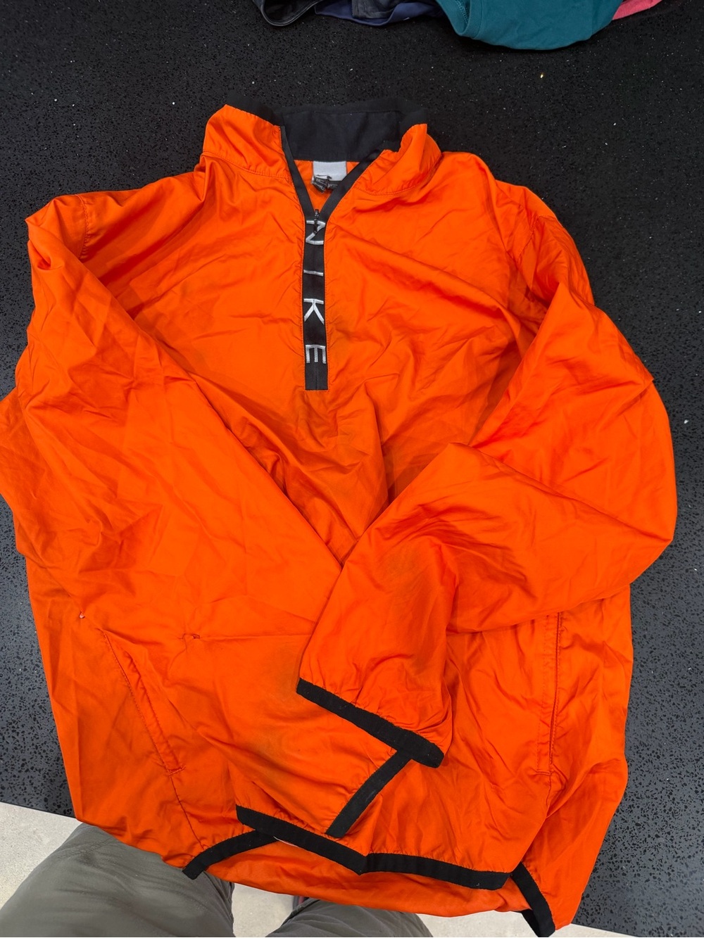 Nike Men’s Bright Orange Half-Zip Windbreaker with Black Trim